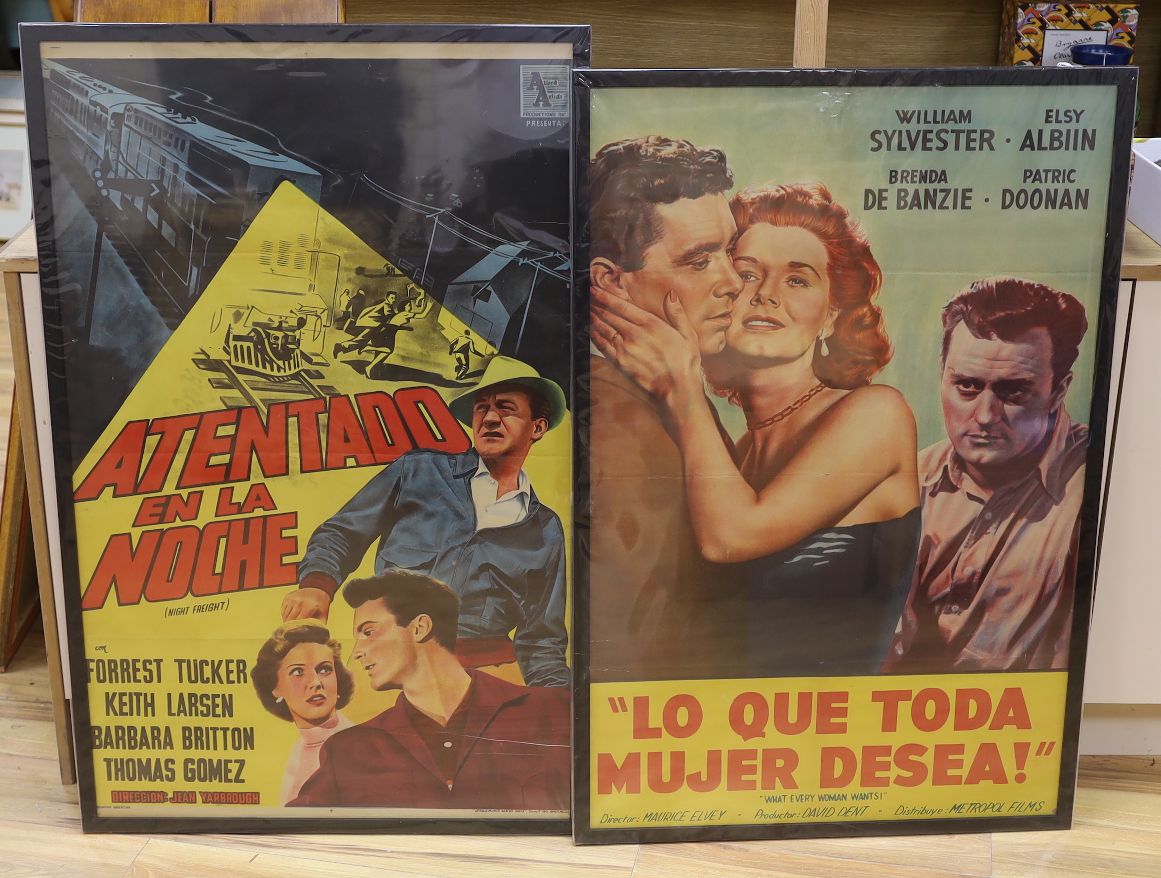 Two Argentinian one sheet film posters. 1954, 'What every Woman Wants', 72.5cm wide x 109cm high including frame, and 'Night Freight' 1955 68cm wide x 108cm high